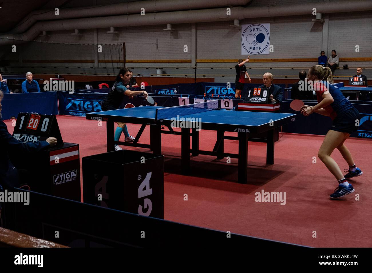 Marina Donner of Finland (blue) plays Rikke Skåttet of Norway (red). Action from the women's international matches art the Finland v Norway European Table Tennis Championships Qualification Group (for the 2023 European tournament) in Helsinki, 17 October 2022. Stock Photo