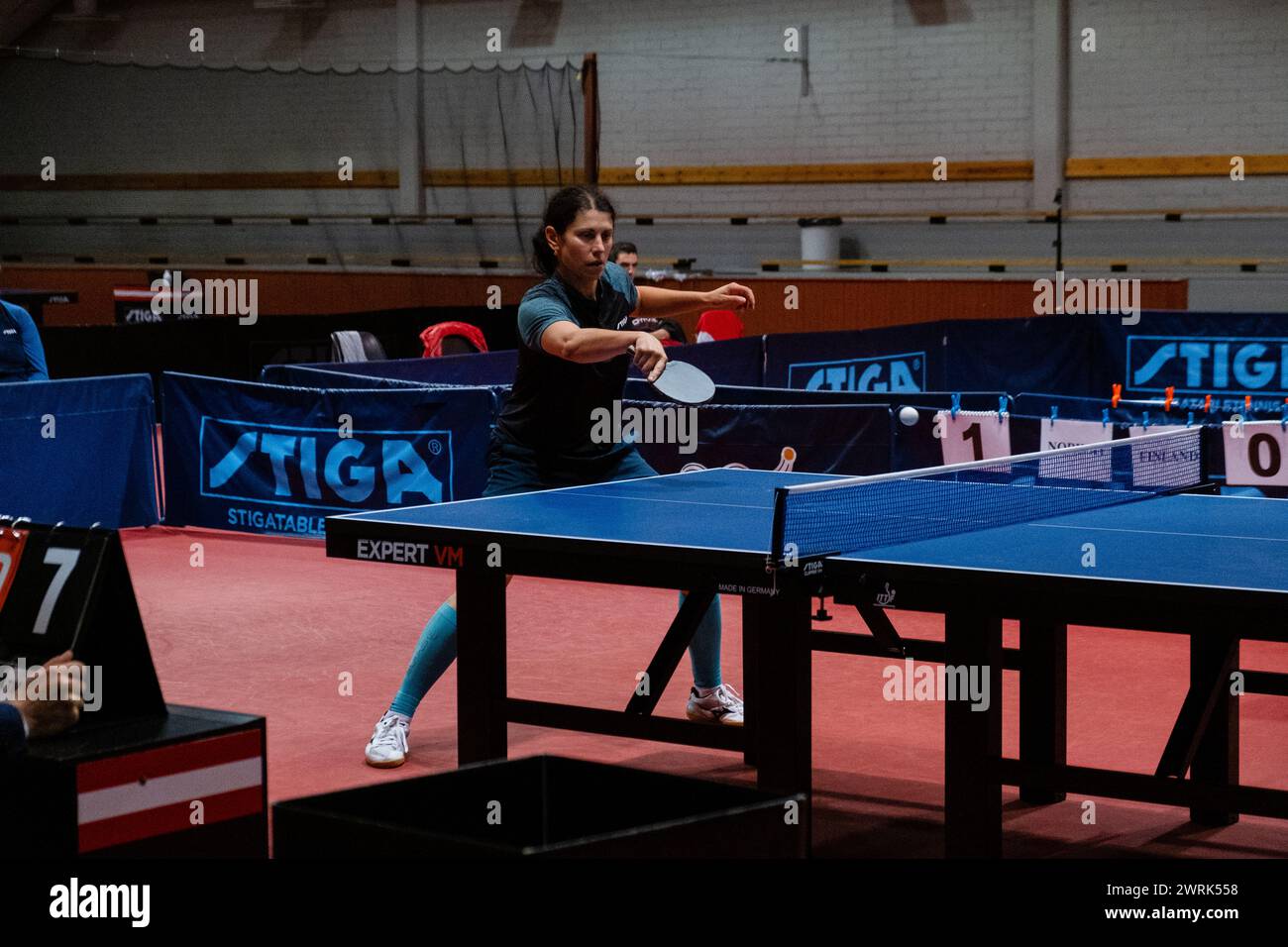 Marina Donner of Finland (blue) plays Rikke Skåttet of Norway (red). Action from the women's international matches art the Finland v Norway European Table Tennis Championships Qualification Group (for the 2023 European tournament) in Helsinki, 17 October 2022. Stock Photo