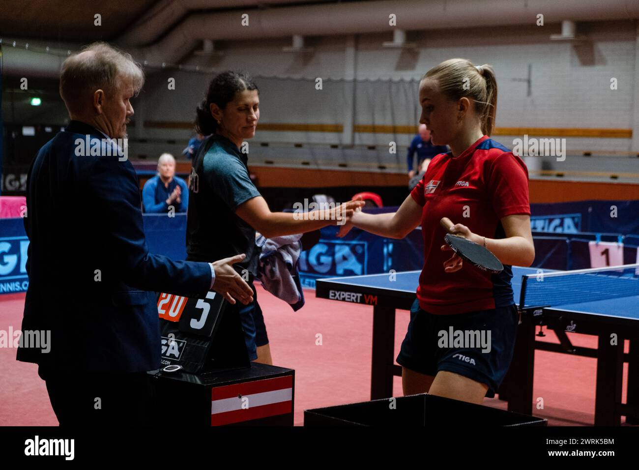 Hand shakes at the end of the match as Donner wins. Marina Donner of Finland (blue) plays Rikke Skåttet of Norway (red). Action from the women's international matches art the Finland v Norway European Table Tennis Championships Qualification Group (for the 2023 European tournament) in Helsinki, 17 October 2022. Stock Photo
