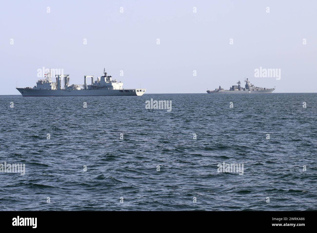 March 12, 2024, Undefined, Iran: The Chinese People's Liberation Army Navy (PLAN) type 903A replenishment ship (902) at sea during the ''Maritime Security Belt 2024'' combined naval exercise between Iran, Russia, and China in the Gulf of Oman. Iran has stepped up its military cooperation with Beijing and Moscow in response to regional tensions with the United States, including by supplying military drones to Russia before the European nation invaded Ukraine in 2022. The military activities -- to be conducted from March 11 through 15 -- are aimed at ''jointly maintaining regional maritime secur Stock Photo