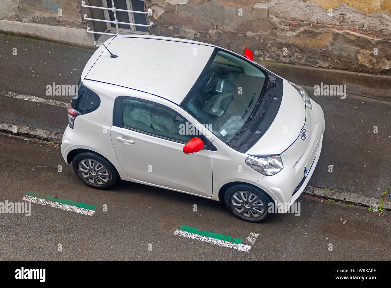 Belgrade, Serbia - January 28, 2023: Small Toyota city car with automatic gear transmission parked outside on urban street Stock Photo