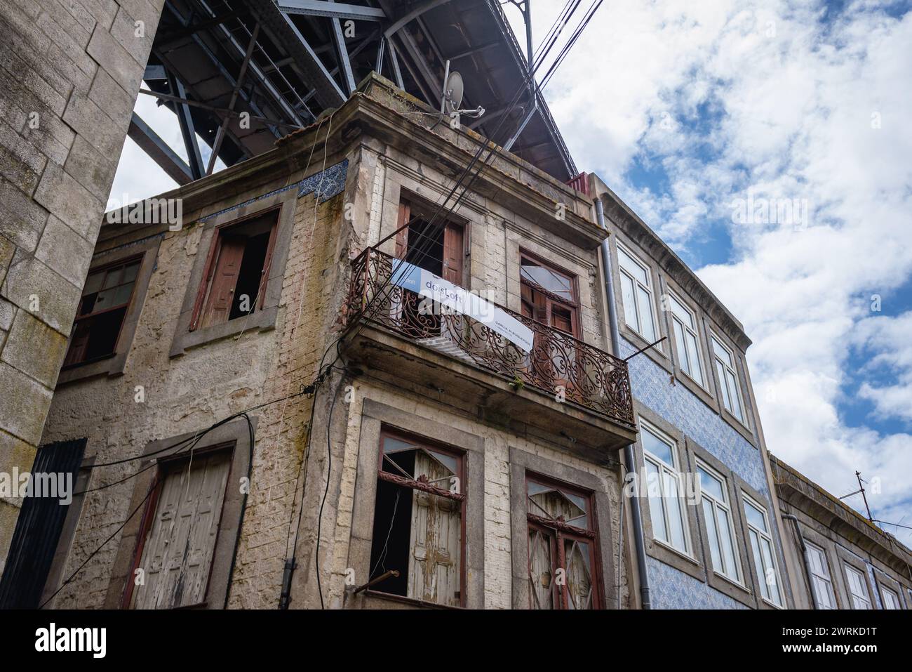 Tenements under the Dom Luis I Bridge on Escadas do Codecal stairs in ...