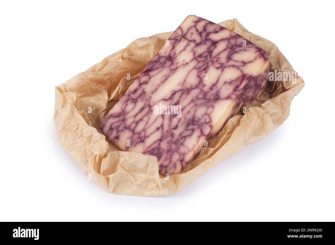 Studio shot of port infused derby cheese cut out against a white background - John Gollop Stock Photo