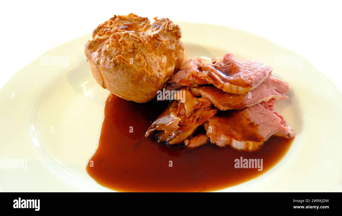 Traditional roast beef and yorkshire pudding on white - John Gollop Stock Photo
