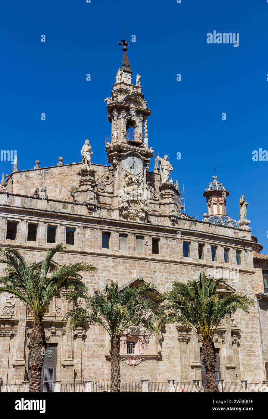 Palm trees in front of the Santos Juanes church in Valencia, Spain Stock Photo