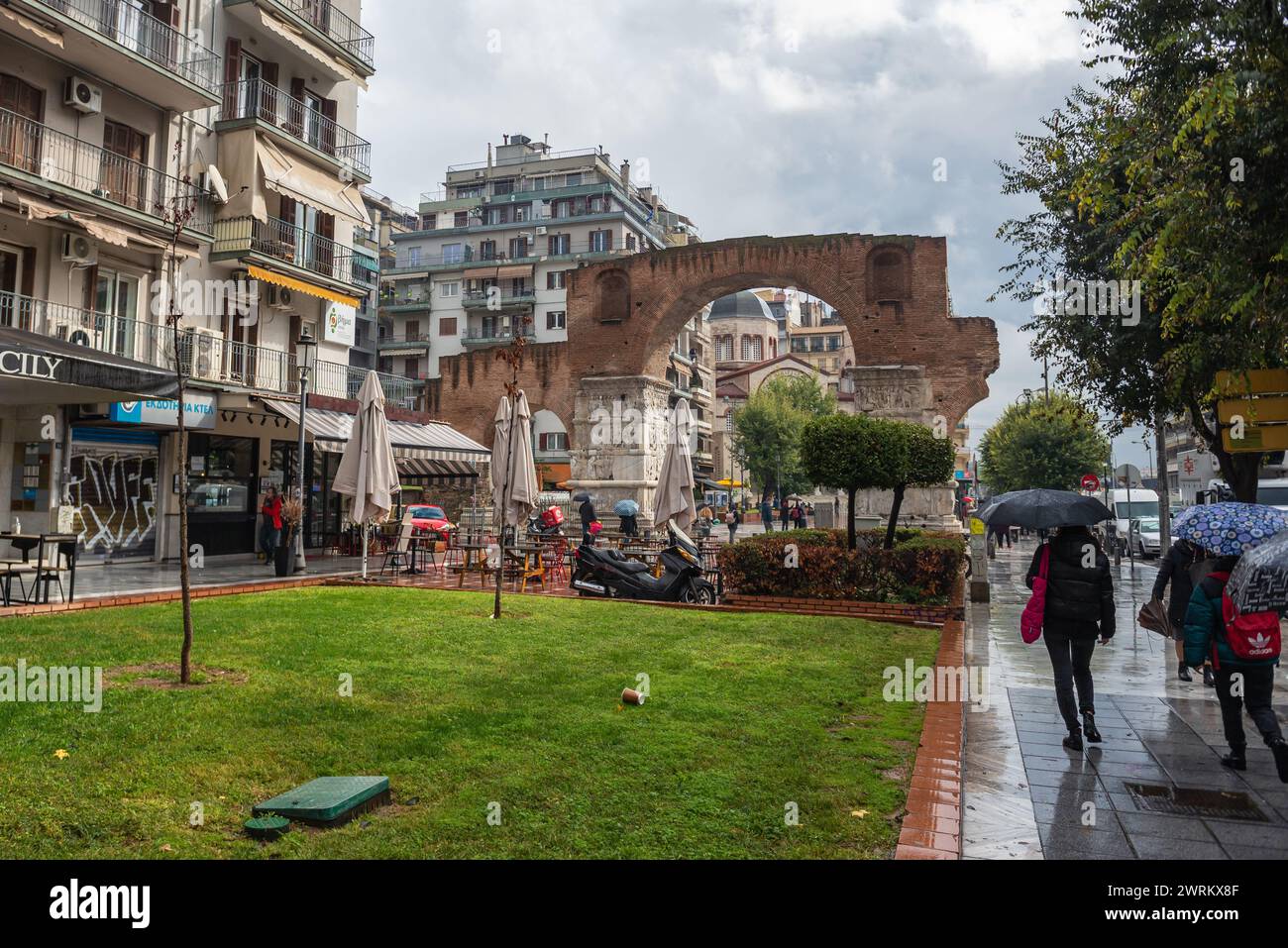Arch of Galerius triumphal arch also known as Kamara in Thessaloniki city, Greece. Church of Panagia Dexia on background Stock Photo
