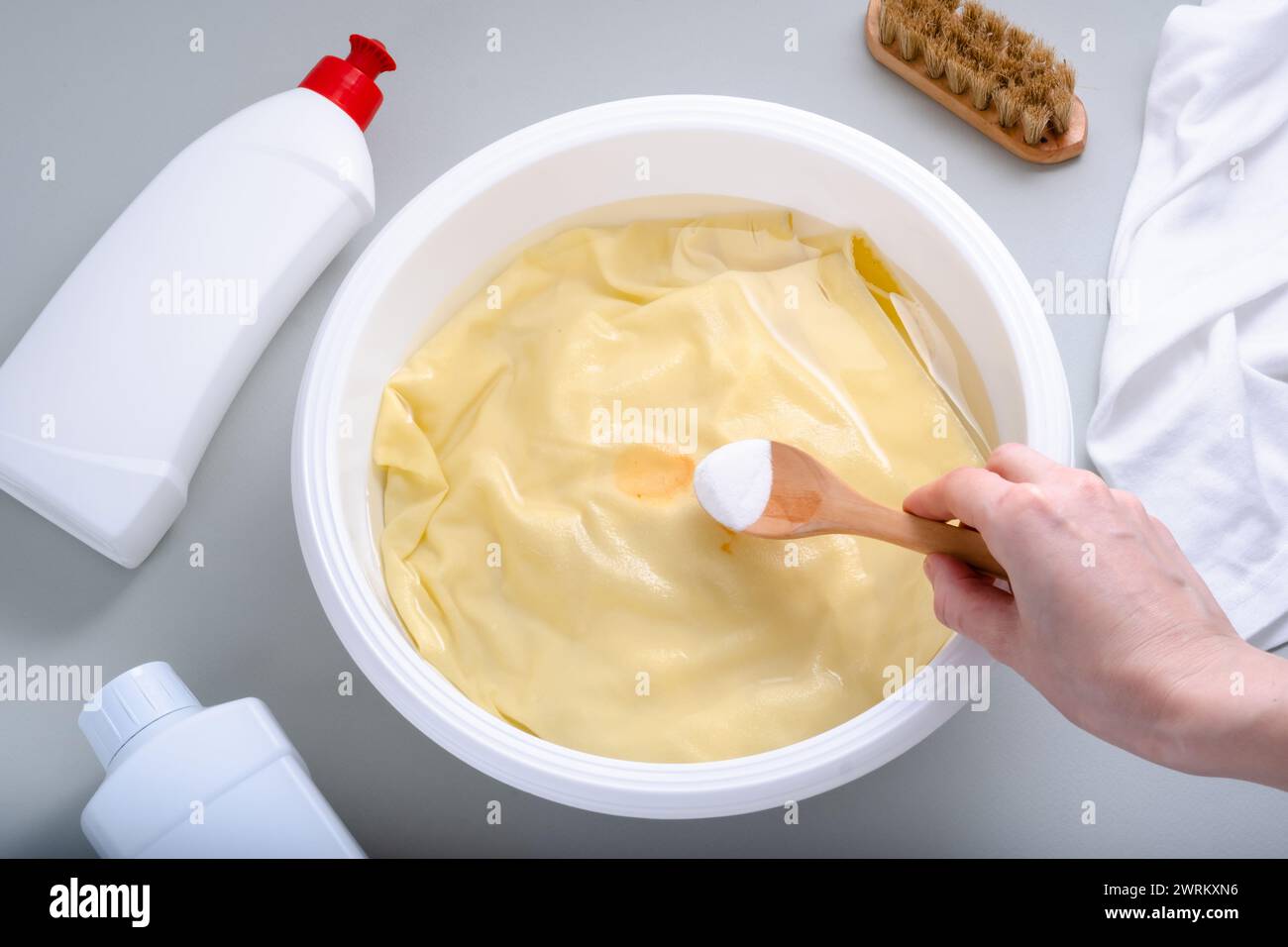 Homemade ecofriendly removing of stains on clothes with baking soda