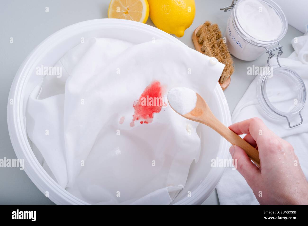 Homemade ecofriendly removing of stains on clothes with baking soda