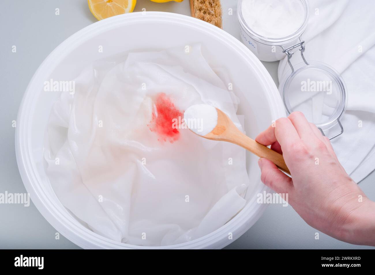 Homemade ecofriendly removing of stains on clothes with baking soda