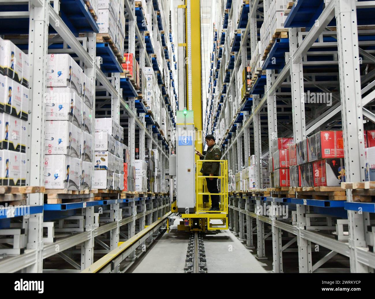 HANDAN, CHINA - MARCH 12, 2024 - A worker is loading and unloading ...