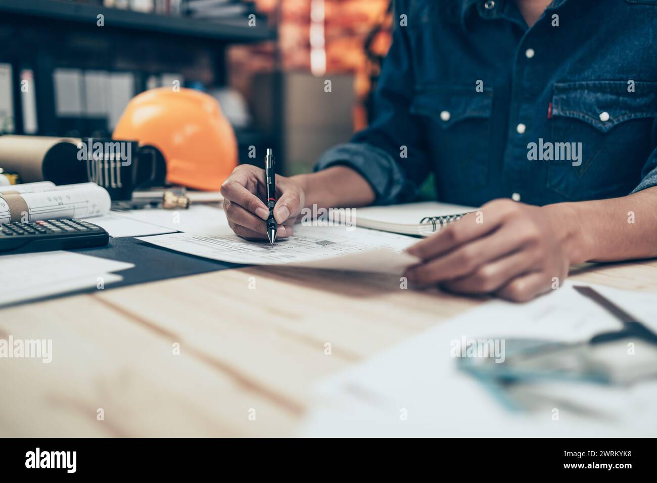 Architect engineer use pen drawing design working on blueprint. House ...