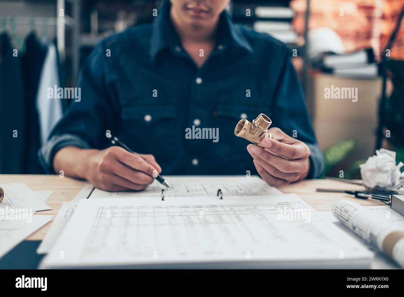 Architect engineer use pen drawing design working on blueprint and ...