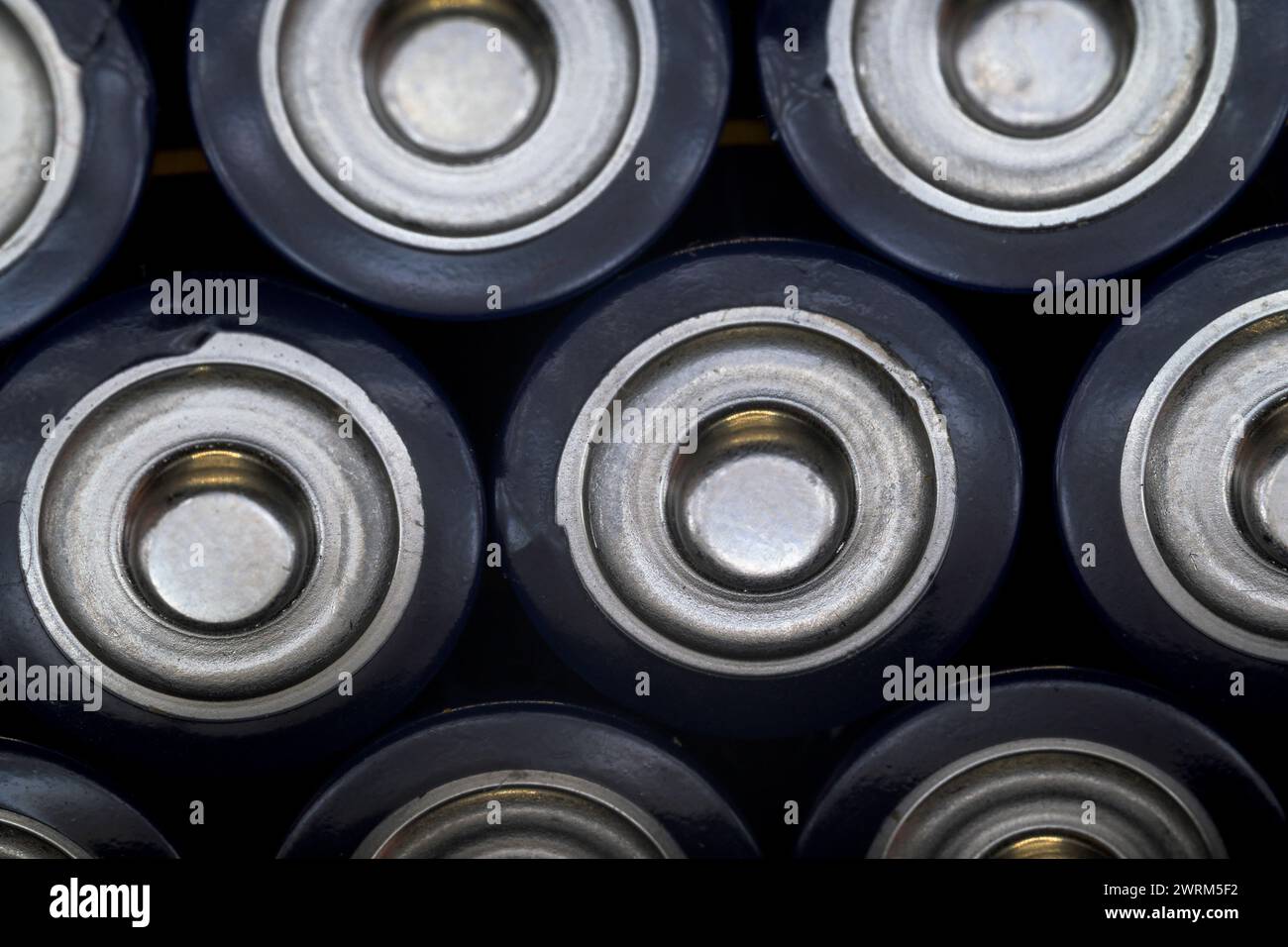 Rechargeable batteries AAA batteries detail positive pole horizontally energy Stock Photo