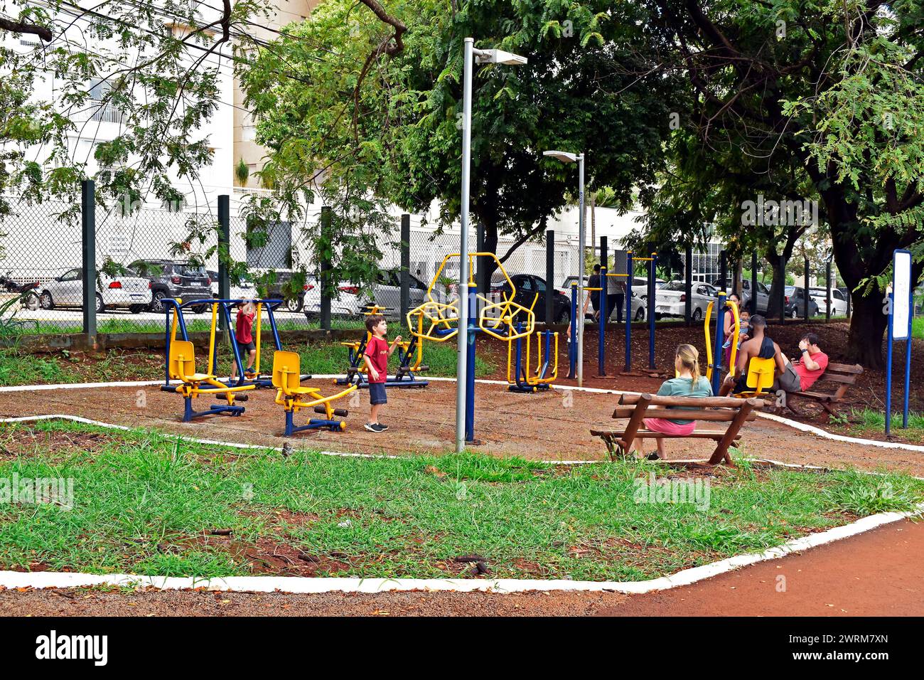 RIBEIRAO PRETO, SAO PAULO, BRAZIL - December 24, 2023: Kids playing in public park Stock Photo