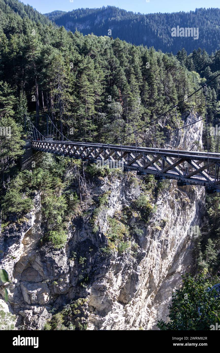 Summer view of the Devils bridge (Pont du diable) above the Arc Gorge in the French alps. This travel destination is situated near Modane in the Vanoi Stock Photo