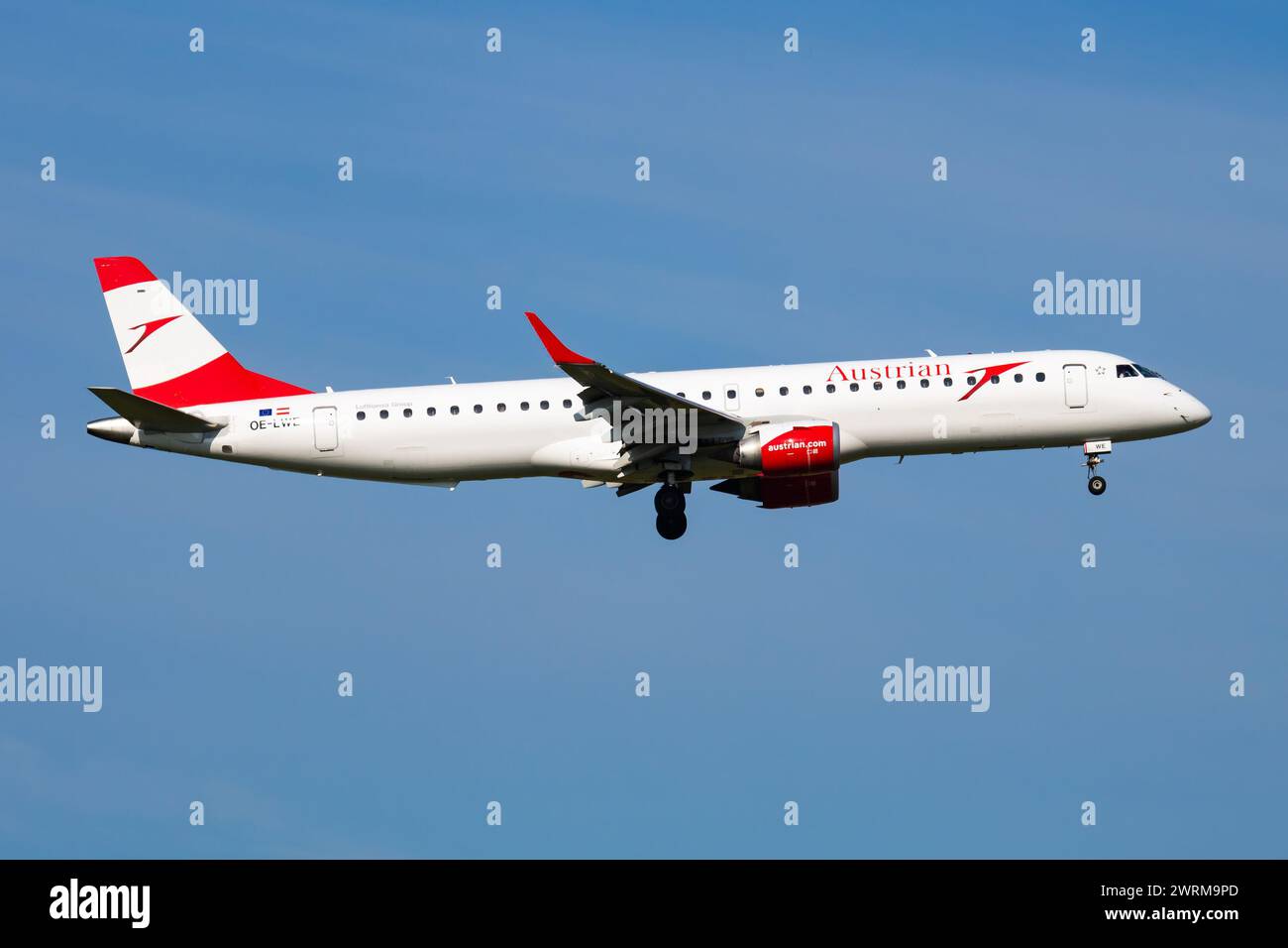 Vienna, Austria - May 20, 2018: Austrian Airlines Embraer ERJ-195 OE-LWE passenger plane arrival and landing at Vienna Airport Stock Photo