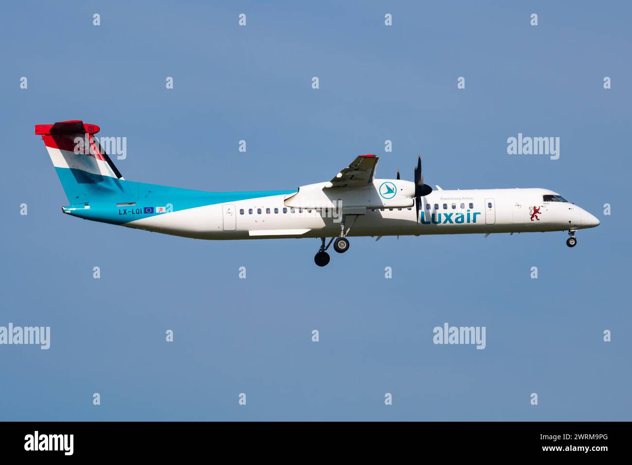 Vienna, Austria - May 20, 2018: Luxair Bombardier DHC-8 Q400 LX-LQI passenger plane arrival and landing at Vienna Airport Stock Photo