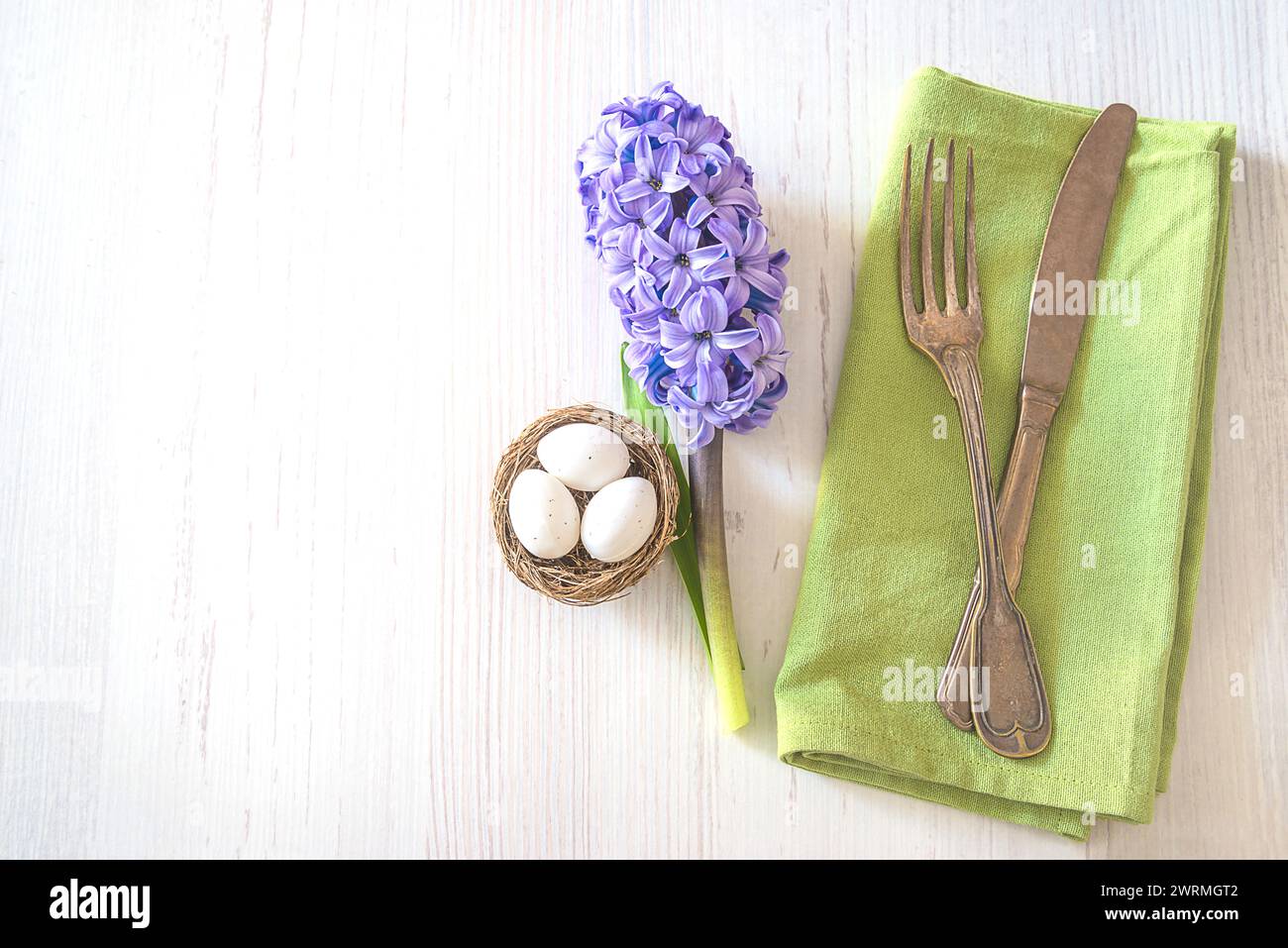 Festive place setting for easter dinner Stock Photo