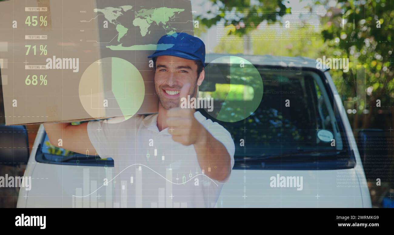 Worker with package gives thumbs up in front of van with digital graphs. Stock Photo