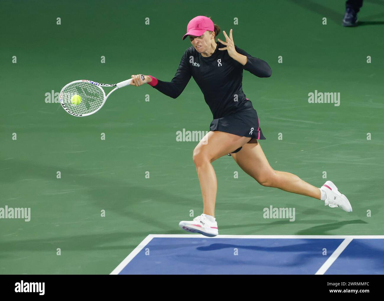 Iga Swiatek (POL) in action at the 2024 Dubai Duty Free Tennis
