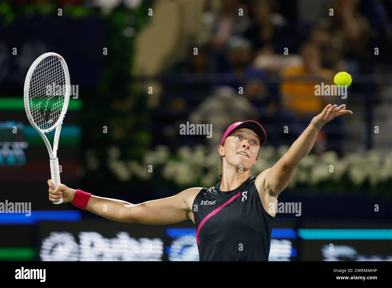 Iga Swiatek (POL) in action at the 2024 Dubai Duty Free Tennis