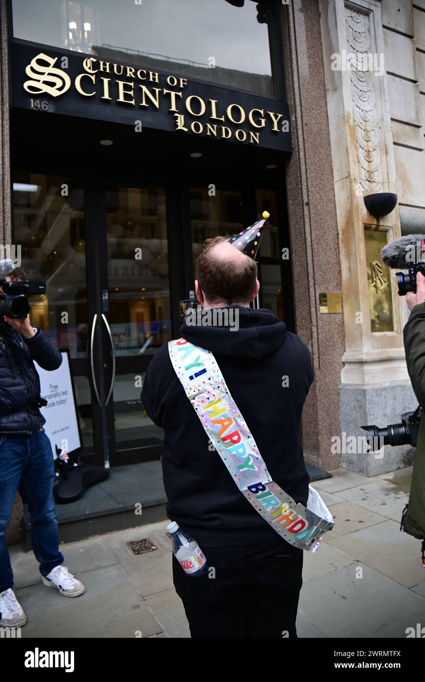 Church of Scientology, London, UK. 13 March 2023: Protest at the birthday party of Lafayette Ronald Hubbard, the founder of the Church of Scientology. The Protestors against the cult Church of Scientology's use of 'Free Personality Test' to lure venerable children and teenagers. A victim, who is only 19 years old, was lured to take the 'Free Personality Test'. Then they will demand that she pay £100 and threaten to prevent her from leaving the building. Another 19-year-old boy was also a victim. He became aggressive towards the family and changed into a totally different person. His brother an Stock Photo