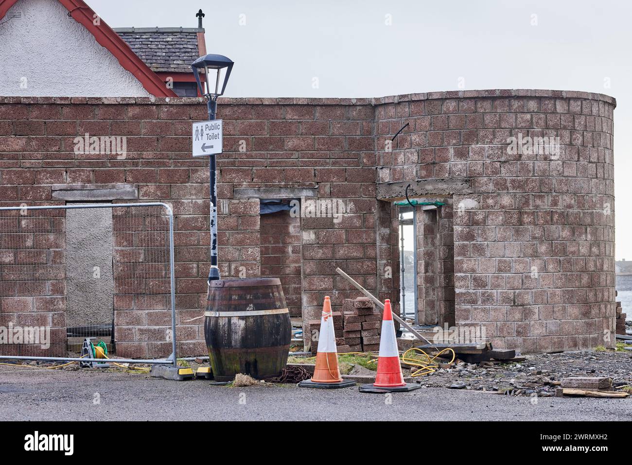 Abandoned for the day, builders leave their tools on site by the shore ...