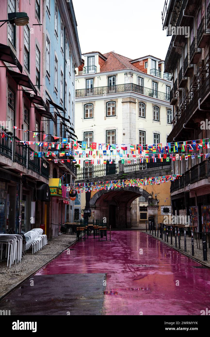 Lisbon's iconic Pink Street: a vibrant, picturesque neighborhood scene Stock Photo