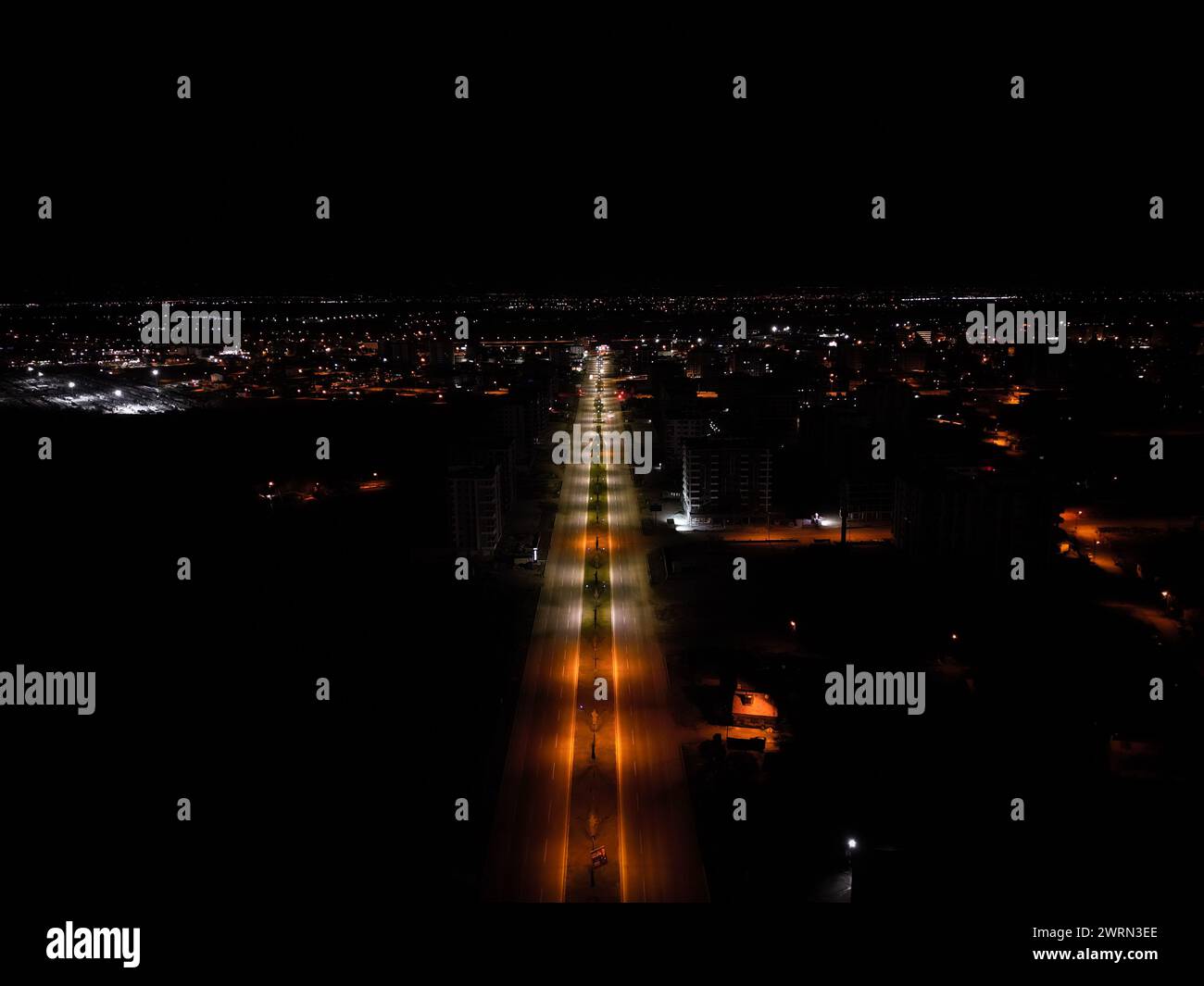 An aerial view of a road illuminated at night Stock Photo - Alamy