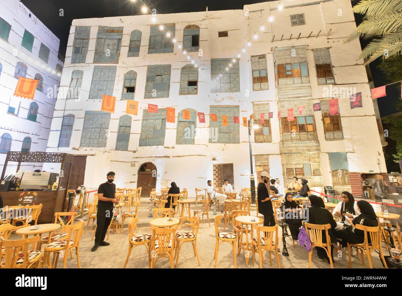 Historical urban scene with outdoor cafe setting, Jeddah, Saudi Arabia Stock Photo