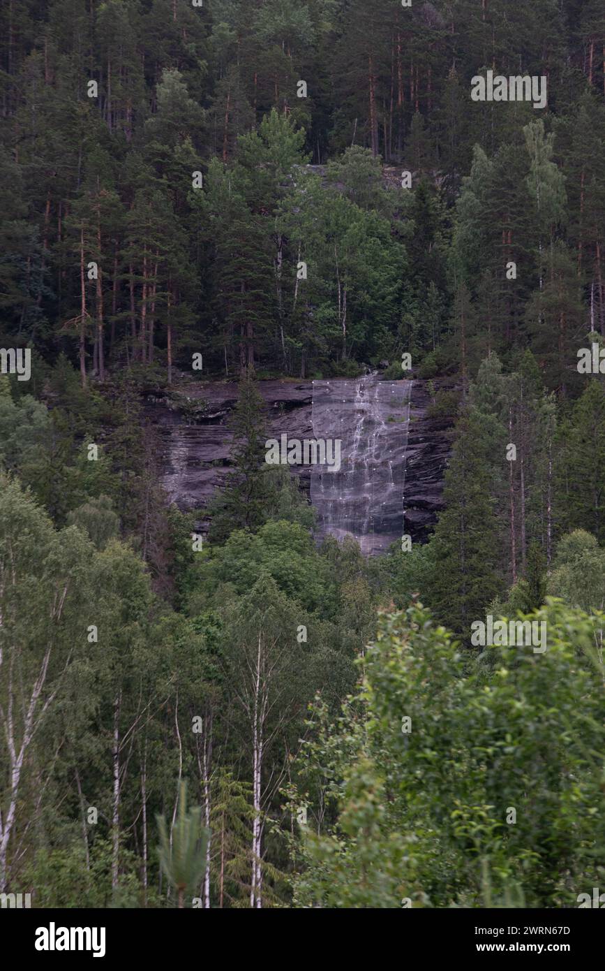 view of a Norwegian mountain secured with a net to prevent a landslide Stock Photo