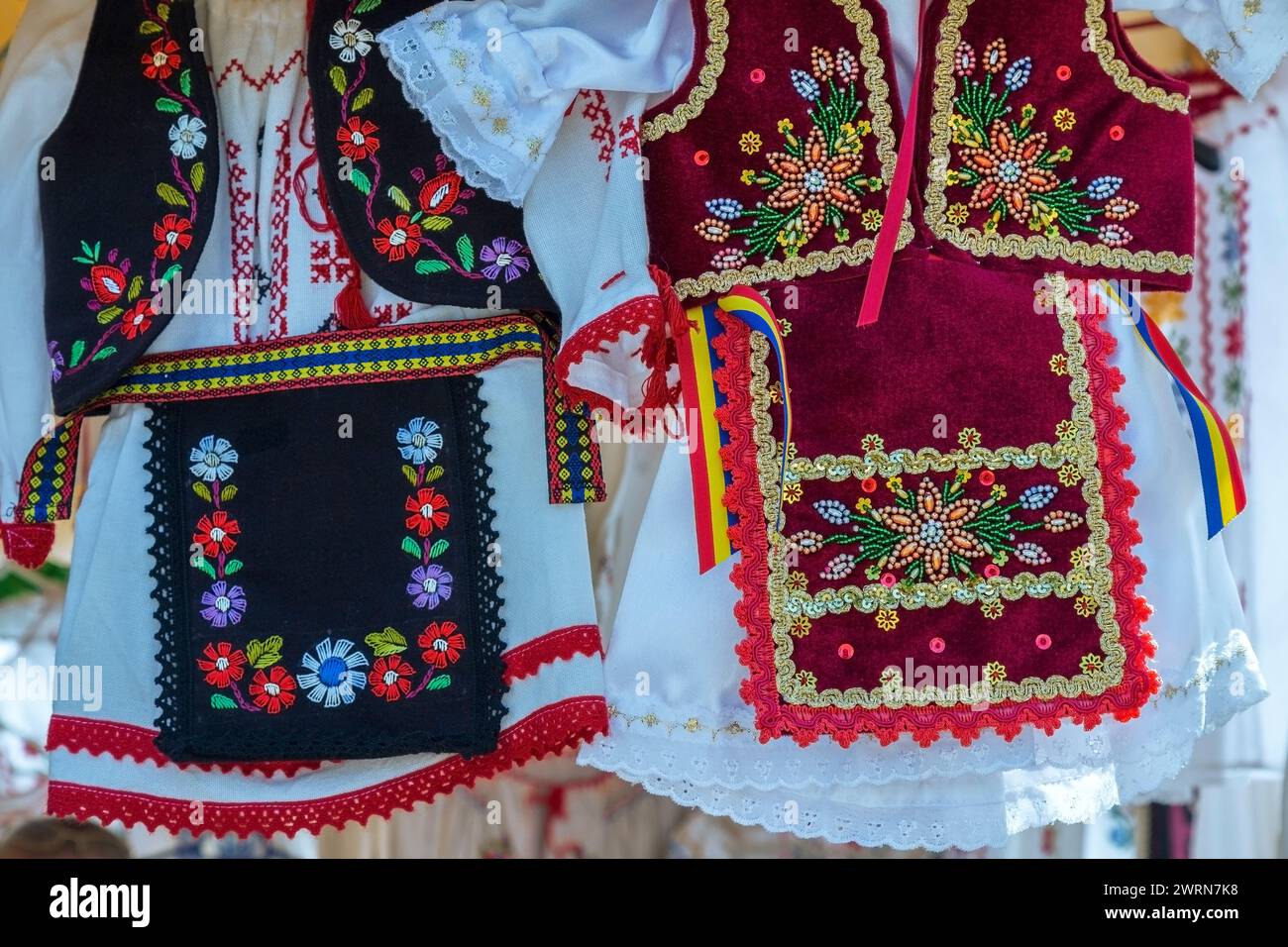 Romanian traditional clothes for girls at a street fair, exposed for ...