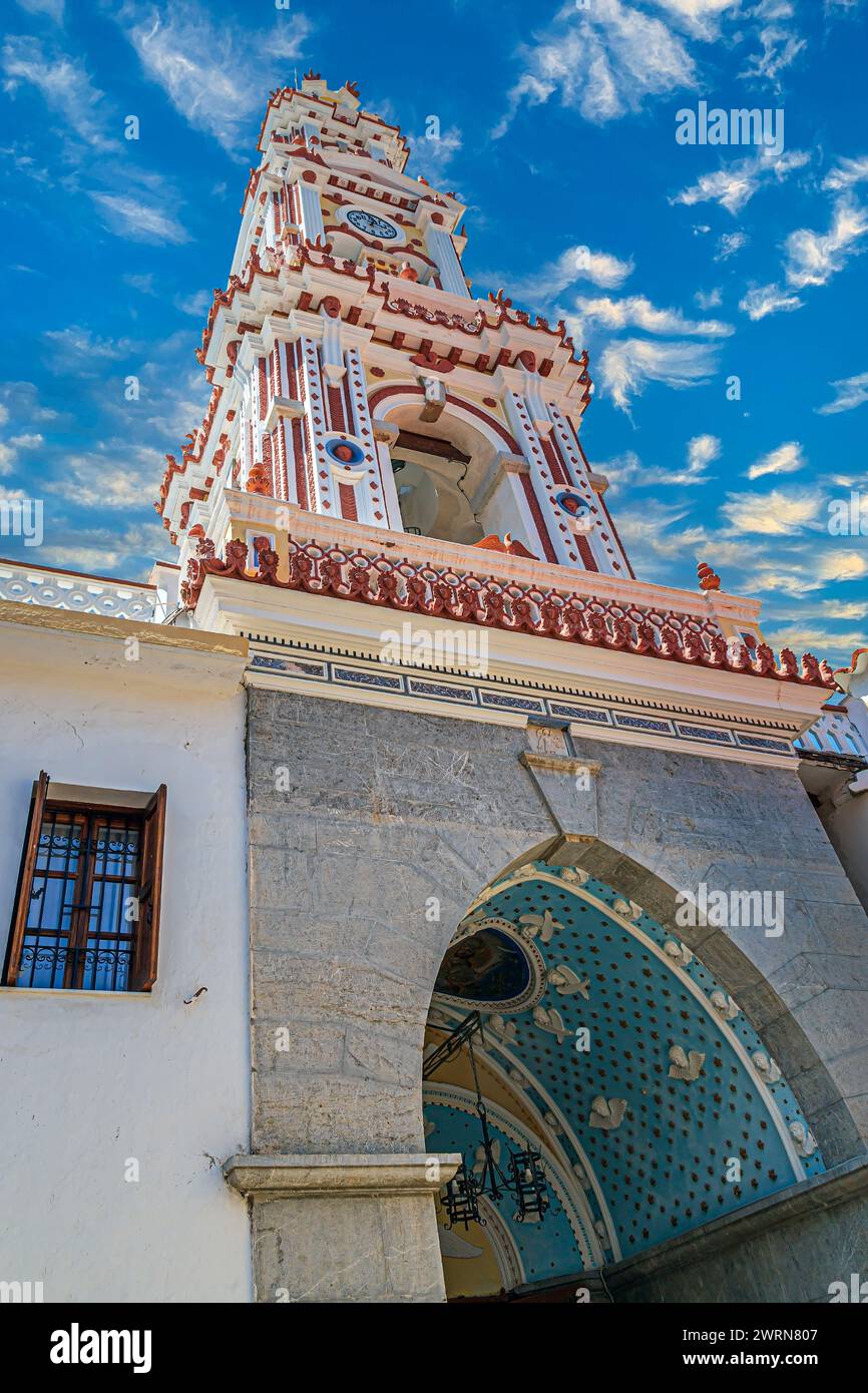 Bell tower of the Monastery of St. Archangel Michael of Panormitis.Greek Orthodox monastery dedicated to Archangel Michael on the Greek island of Symi Stock Photo