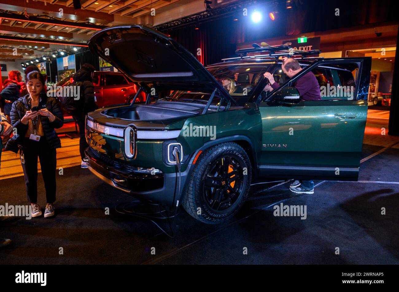 Toronto, ON, Canada - February 16, 2024:  Rivian, a U.S. manufacturer of electric vehicles presents a model R1S SUV and R1T pickup in the Metro Toront Stock Photo