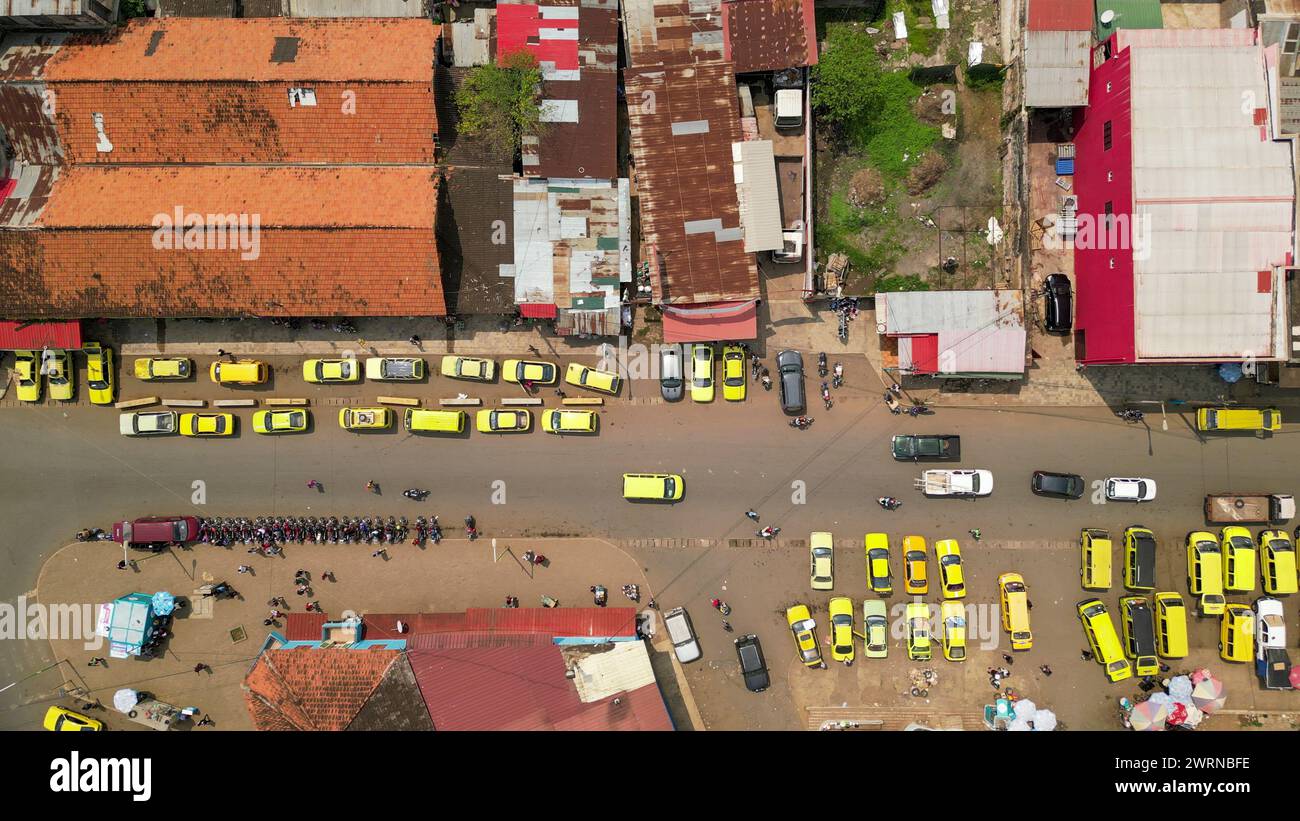 Seen from above a cluster of stopped taxis in the city of Sao Tome,Africa Stock Photo