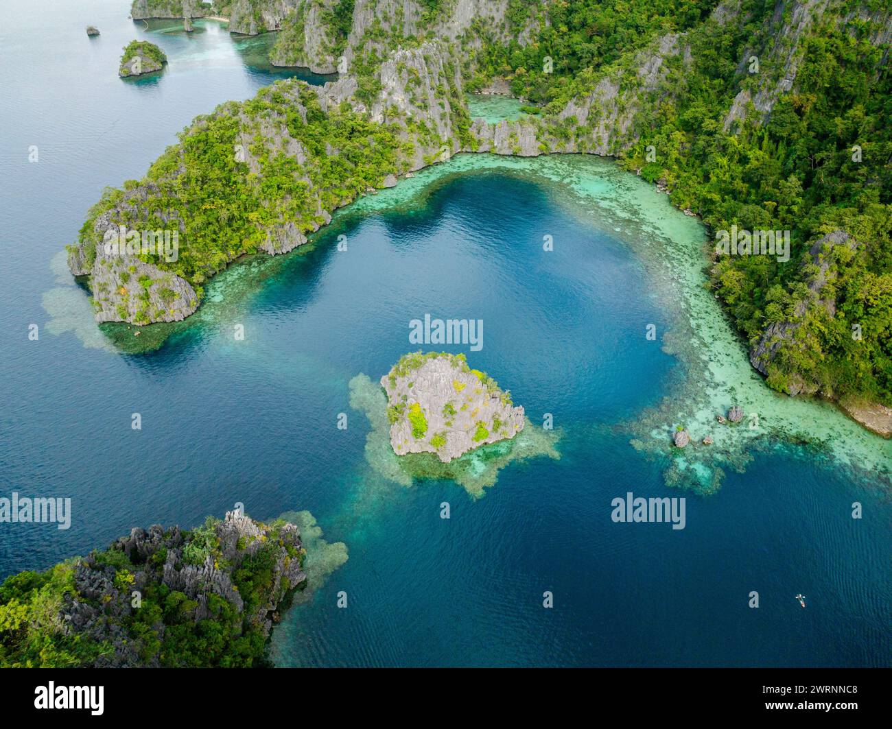 Transparent lagoon corals limestone rocks hi-res stock photography and ...