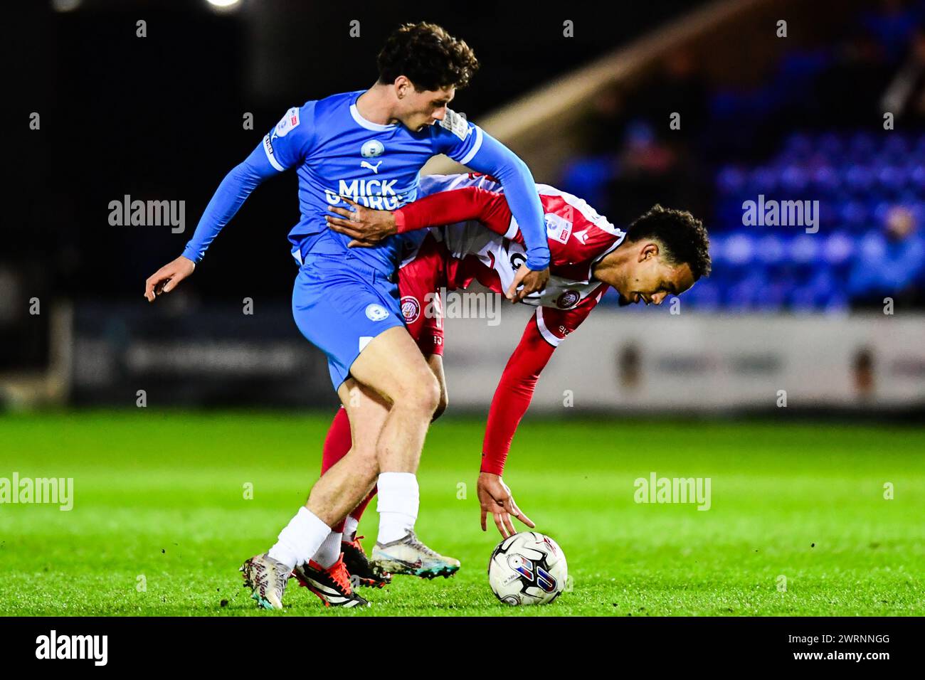 Terence Vancooten (15 Stevenage) challenged by Joel Randall (14 Peterborough United) during the Sky Bet League 1 match between Peterborough and Stevenage at London Road, Peterborough on Wednesday 13th March 2024. (Photo: Kevin Hodgson | MI News) Credit: MI News & Sport /Alamy Live News Stock Photo