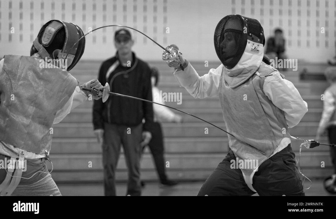UNITED STATES - 03–082024: Out of Nowhere Fencing,  offers instruction in the sp-ort of fencing for all levels under the watchful eye of coach David C Stock Photo