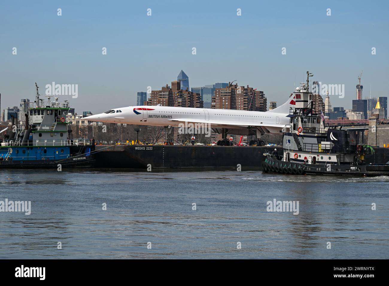 The Intrepid Museum's British Airways Concorde rides on a barge down ...