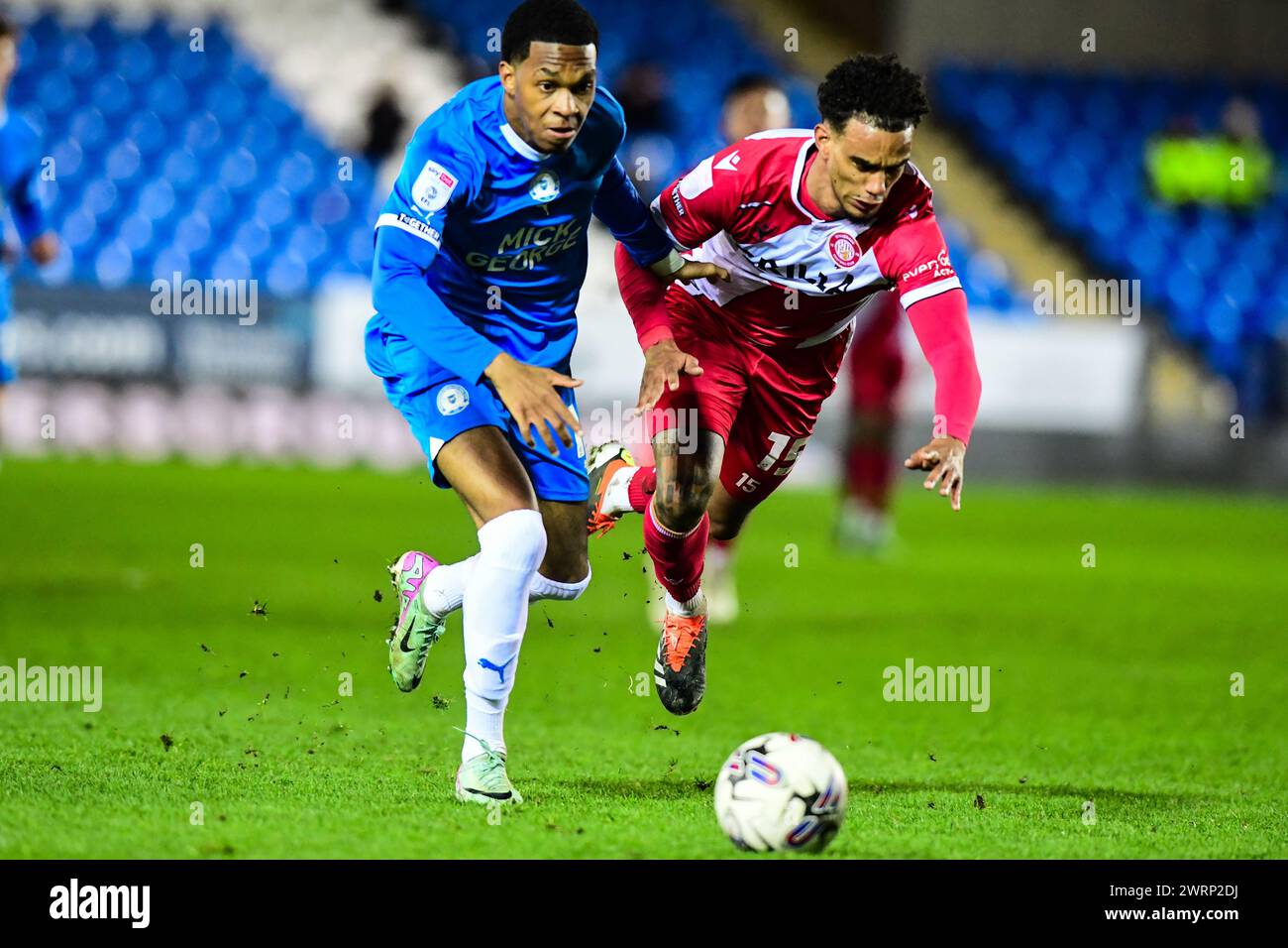 Malik Mothersille (18 Peterborough United) challenged by Terence Vancooten (15 Stevenage) during the Sky Bet League 1 match between Peterborough and Stevenage at London Road, Peterborough on Wednesday 13th March 2024. (Photo: Kevin Hodgson | MI News) Credit: MI News & Sport /Alamy Live News Stock Photo