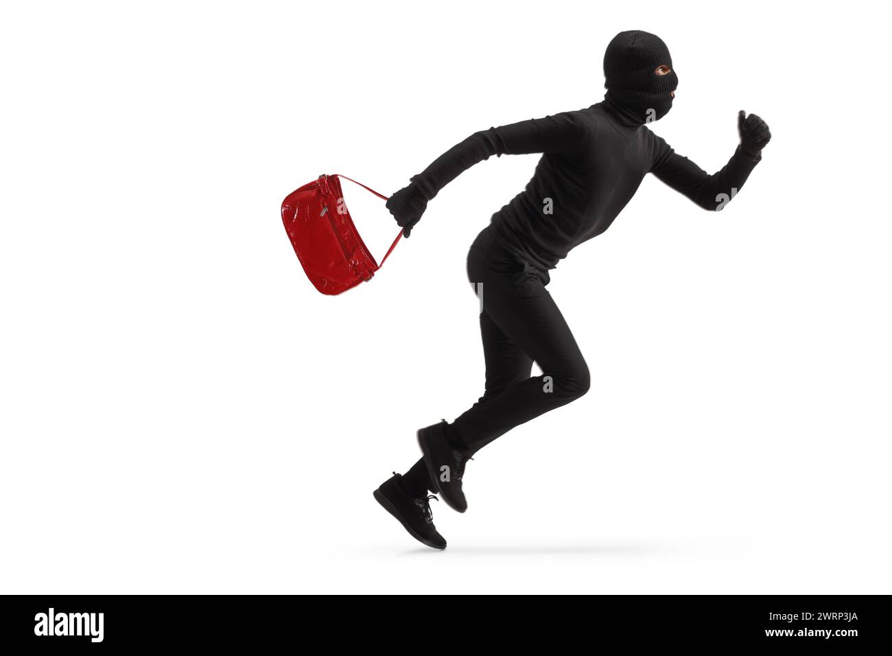 Full length profile shot of a thief in disguise running with a stolen purse isolated on white background Stock Photo