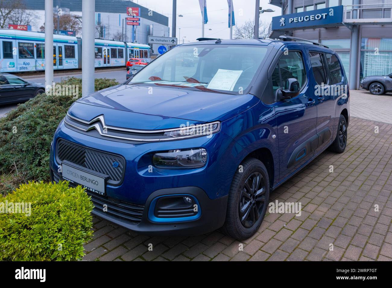 blue Citroen E-Berlingo stylish and spacious electric van in parking lot, French manufacturer PSA Citroen, automotive industry, Sustainable Transporta Stock Photo