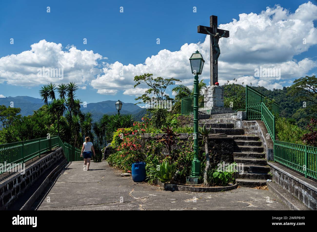Wide view of Mirante do Cristo observation deck located at Washington Luiz highway, close to Petropolis under summer afternoon sunny clouded sky. Stock Photo