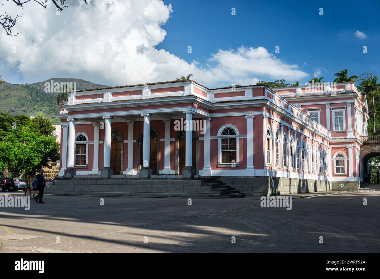 Side view of the Petropolis Imperial Palace, location of Imperial Museum of Brazil in Centro district under summer afternoon sunny clouded blue sky. Stock Photo