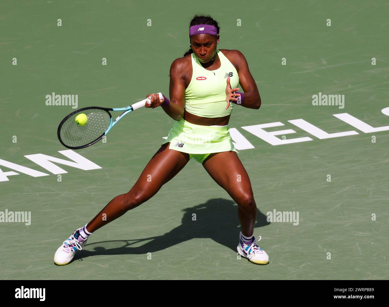 March 13, 2024 Coco Gauff returns a shot against Elise Mertens of