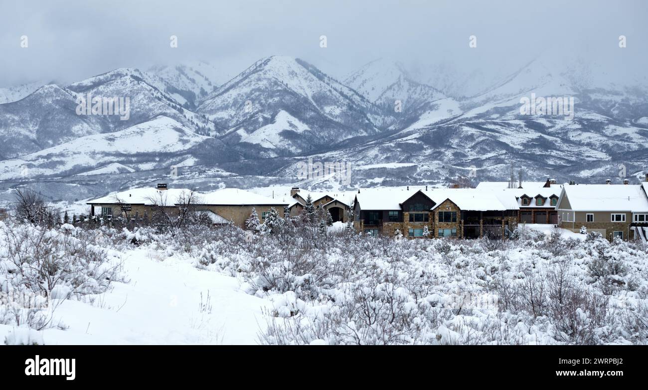 Recently built houses in Mountain Green, Morgan County, Utah, with mountains of the Wasatch Range in the background. Stock Photo
