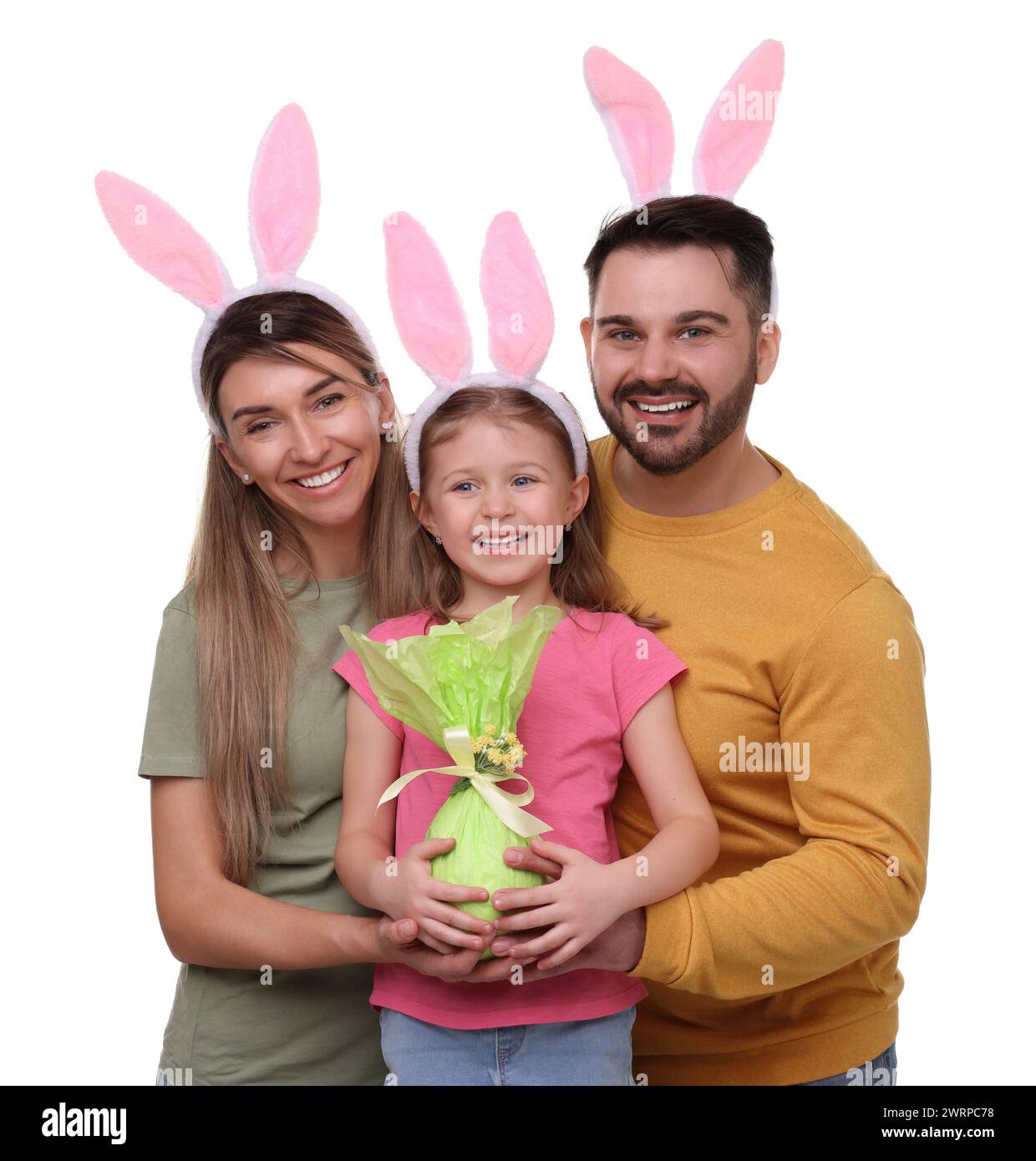 Easter Celebration. Happy Family With Bunny Ears And Wrapped Egg 