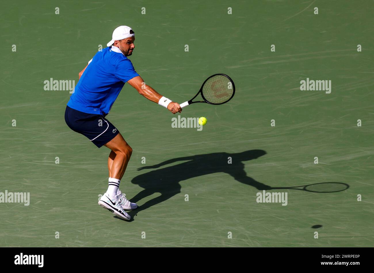 March 13, 2024 Grigor Dimitrov of Bulgaria returns a shot against