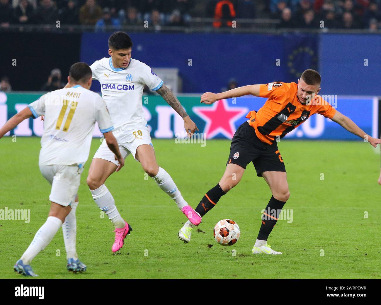 Hamburg, Germany - February 15, 2024: Joaquin Correa of Marseille (L) fights for a ball with Yehor Nazaryna of Shakhtar Donetsk during their UEFA Europa League game at Volksparkstadion in Hamburg Stock Photo