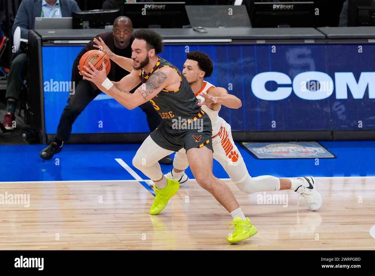 Boston College guard Jaeden Zackery (3) and Clemson guard Chase Hunter ...